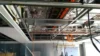 View of an exposed ceiling with visible metal framing.